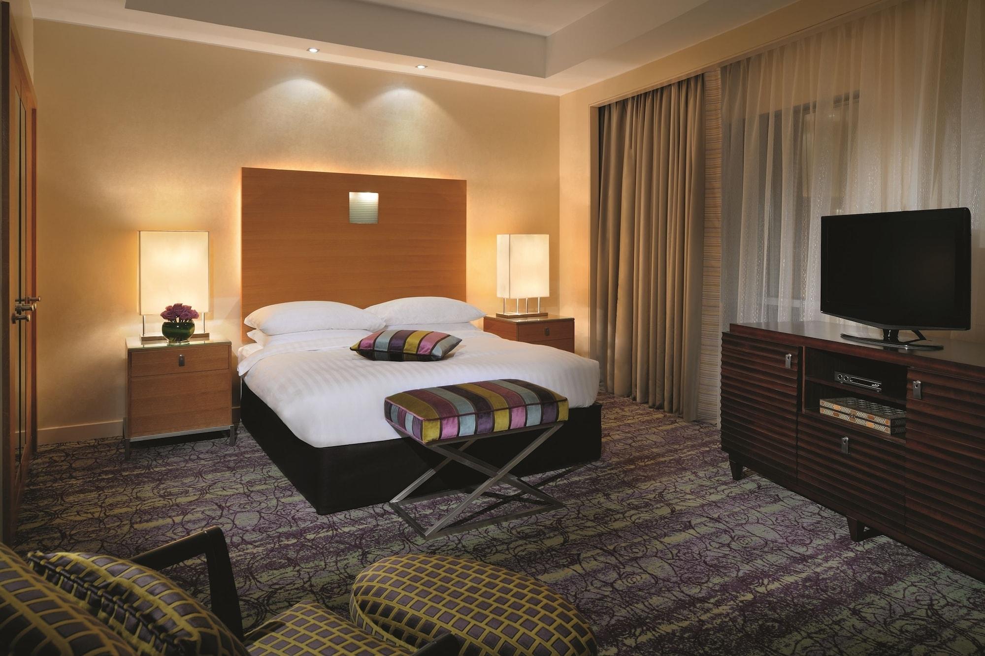 モーベンピック ホテル ウエスト ベイ ドーハ 部屋 写真 A bedroom at the hotel